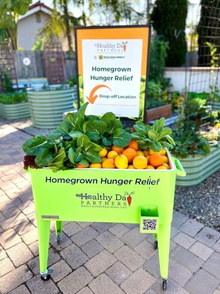 a photo of a cooler full of donated produce